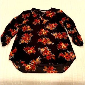 Fun floral print blouse.